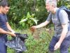 two participants holding plant